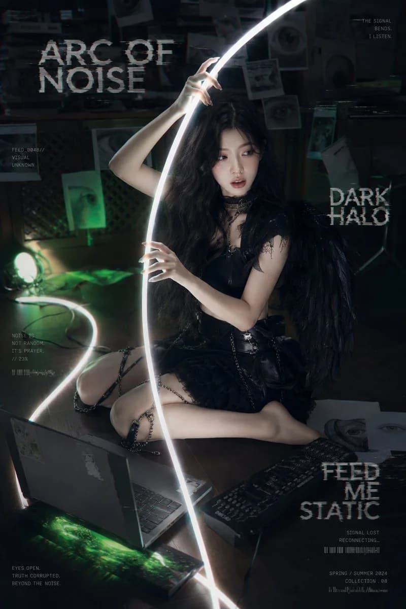 A cinematic glitch-fashion poster of a black-winged cyber-goth woman in a surveillance lab
