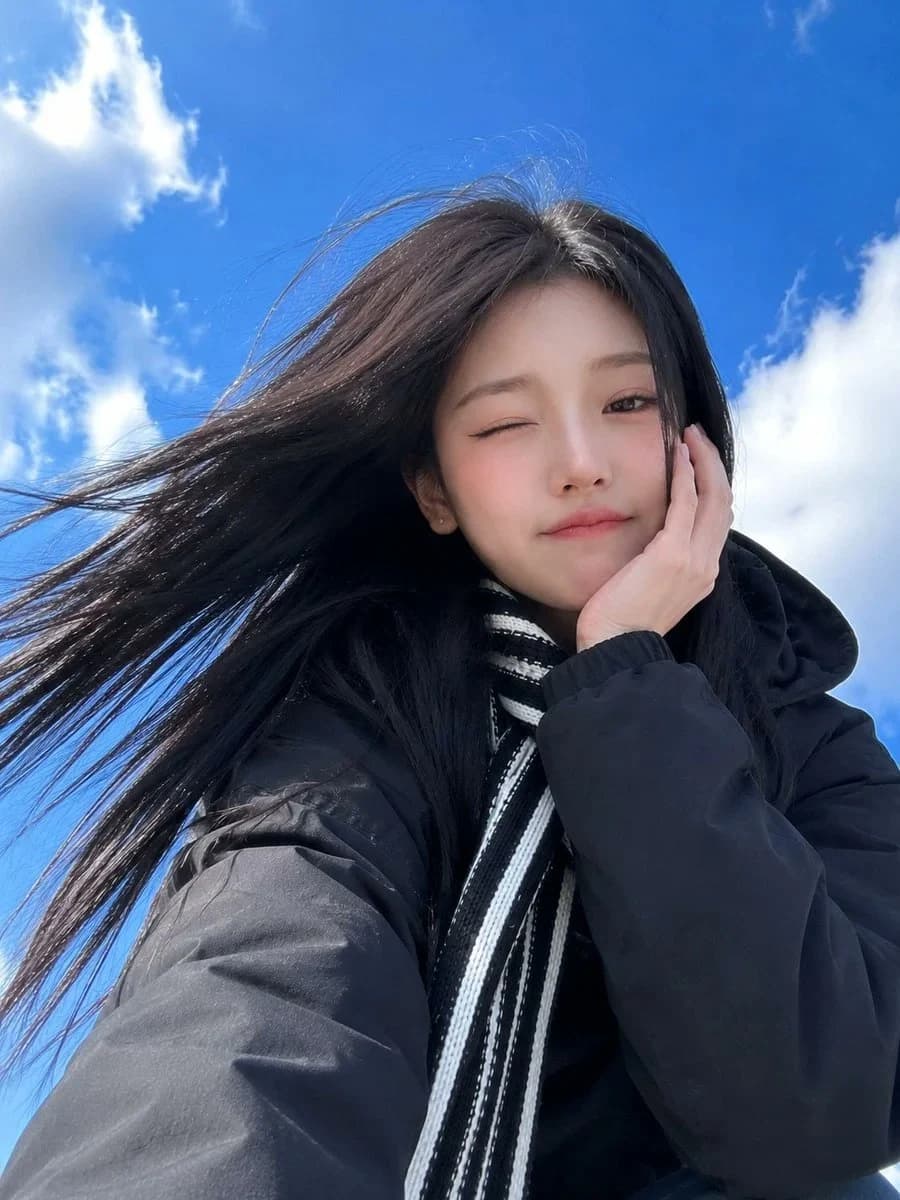 Low-Angle Winter Scarf Selfie portrait visual