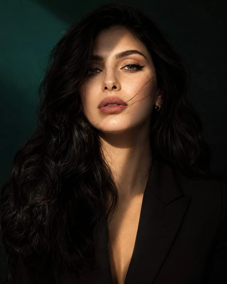 Luxury fashion beauty portrait preserving facial identity with polished editorial lighting and high-end styling.
